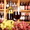 Selection of red and white wines in wine glasses and bottles